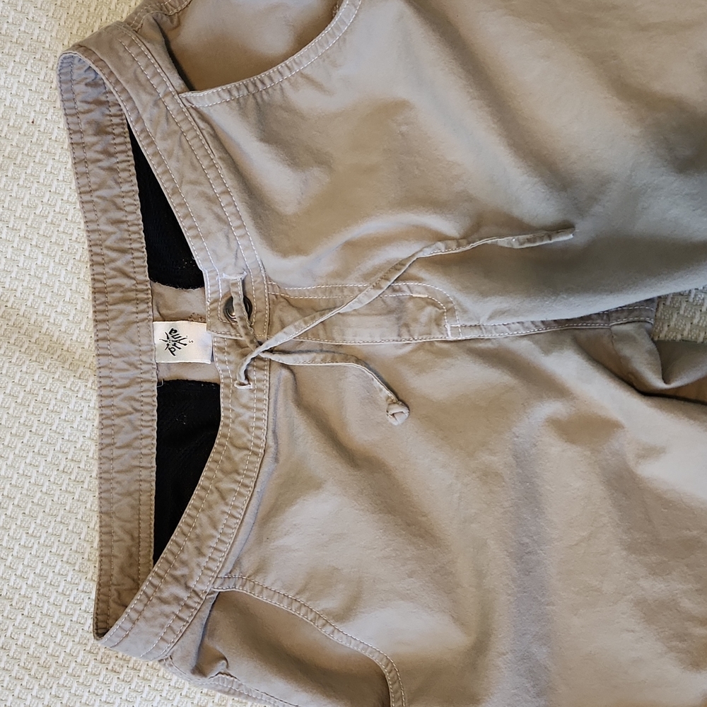 Tan capri Prana S pants. With cargo pockets.